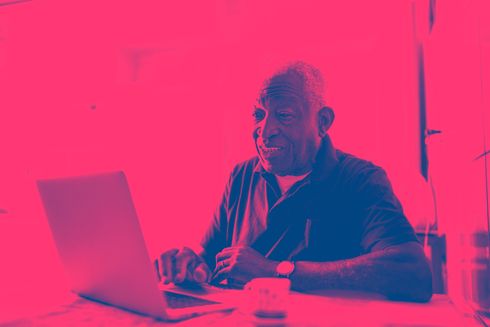 Old man working on computer
