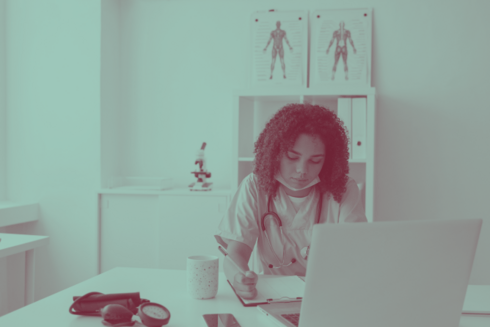 Woman doctor working desk